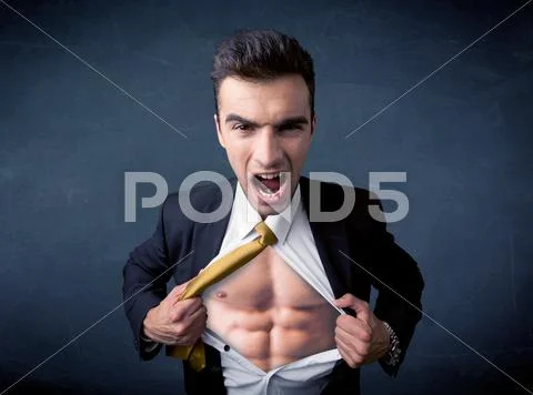 Businessman tearing off shirt and showing mucular body Stock Photos