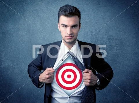 Businessman tearing shirt with target sign on his chest Stock Photos