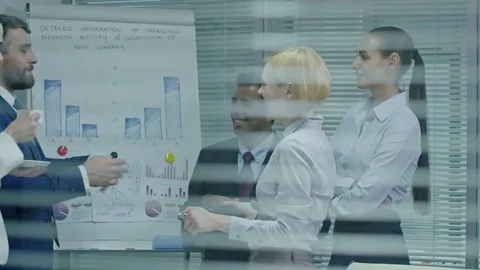 Businessman Telling Joke during Meeting Stock Footage