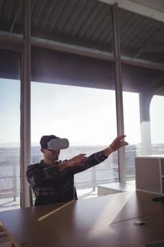 Businessman testing virtual reality technology Stock Photos