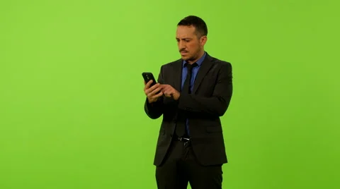 Businessman text message greenscreen ms  4K Stock Footage 61984347