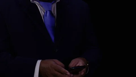 Businessman Texting Video stock 128164226