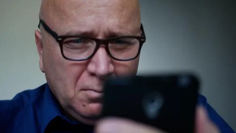 Businessman Texting a Message Using a Cellphone 스톡 사진