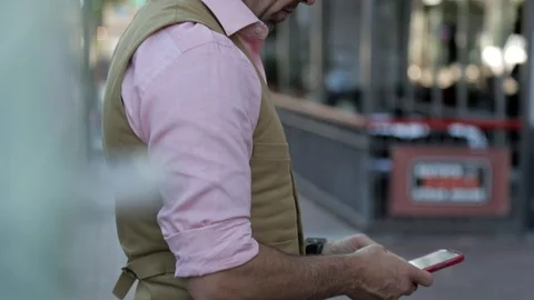 Businessman Texting in Public Stock Footage 100034197