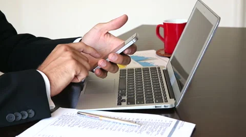 Businessman Texting, Sending Sms During Work Stock Footage 55498327
