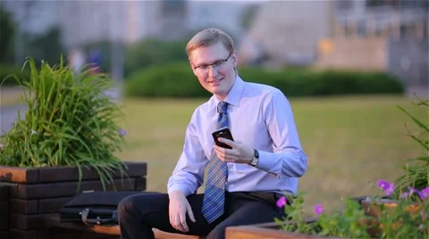 Businessman is texting on the smartphone Stock Footage 68056913