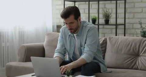 Businessman think of problem solution typing on computer working indoor Stock Footage 138762304