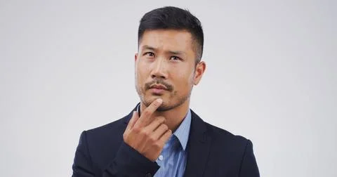 Businessman, thinking and decision in studio, insight and problem solving on Stock Photos