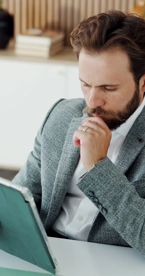 Businessman, thinking and problem solving in office with tablet, financial Stock Footage 330654589