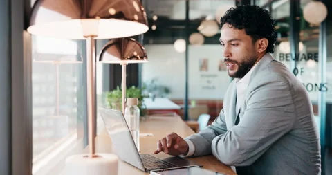 Businessman, thinking and remote work in cafe with laptop, planning and typing Stock Footage 335858835