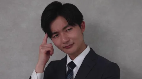 Businessman Thinking Deeply with Finger on Temple and Serious Expression Vídeos de archivo 344085854
