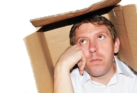 Businessman thinking inside the box Stock Photos