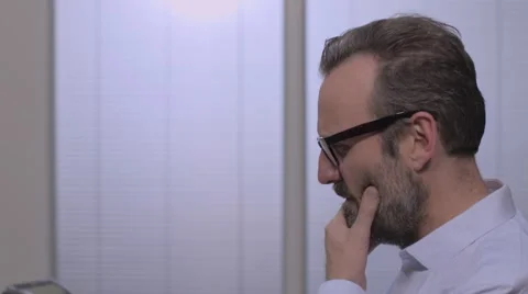 Businessman thinking in the office Stock Footage 68614945