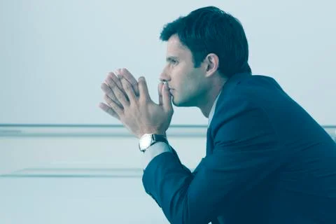 Businessman thinking in office Stock Photos