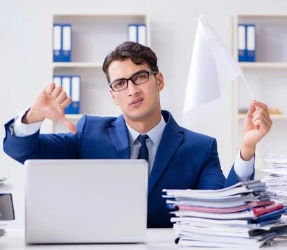Businessman throwing white flag and giving up Stock Photos