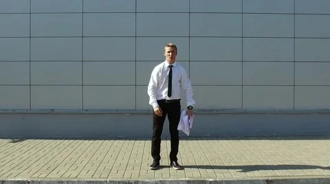 Businessman throws paper and make a back flip in slow motion Stock Footage 67343741