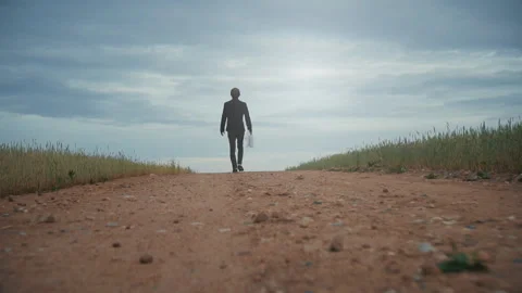 Businessman throws papers and documents into the air in the middle road in the Stock Footage 91328843