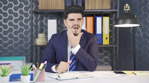 Businessman with a toothache. Toothache. Video stock 236586272