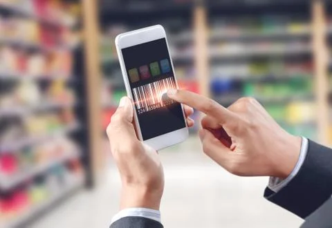 Businessman touch barcode on mobile device, warehouse and logistics Stock Photos