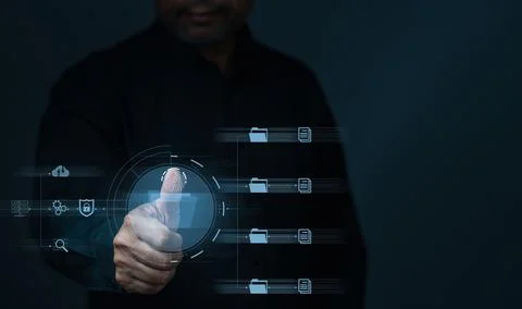 Businessman touch id to using technology with virtual screen. Process data .. Stock Photos