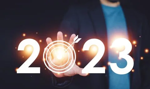 Businessman touch visual screen on 2023 business target planning Stock Photos