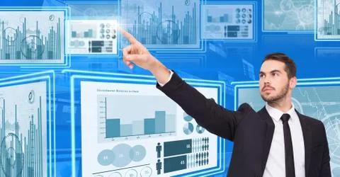 Businessman touching and interacting with technology interface panels 스톡 사진