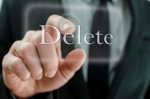 Businessman touching Delete button Stock Photos