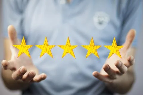Businessman touching technology interface with ranking stars Stock Photos
