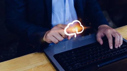 Businessman touching virtual cloud computing to transfer database. informat.. Stock Photos