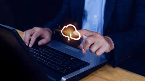 Businessman touching virtual cloud computing to transfer database. informat.. Stock Photos