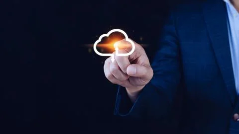 Businessman touching virtual cloud computing to transfer database. informat.. Stock Photos