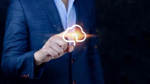 Businessman touching virtual cloud computing to transfer database. informat.. Stock Photos