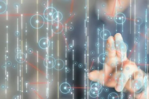 Businessman touching a virtual icon on a computer binary code Stock Photos