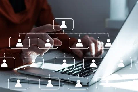 Businessman touching virtual network icons at home office Stock Photos