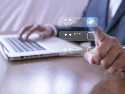 Businessman touching the virtual screen check mark joyful Smile face icon to  Stock Photos