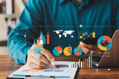 Businessman touching virtual screen Graph analysis of business growth and i.. Stock Photos