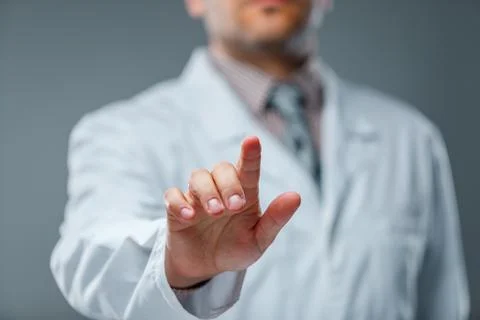 Businessman touching virtual screen, user interface and business technology.. Stock Photos