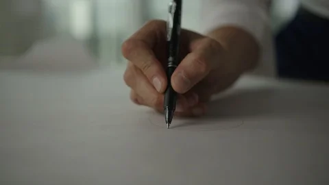 Businessman traces a project in office with view on downtown LA and skyscrapers Vidéo 127412380