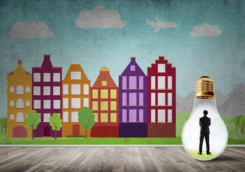 Businessman trapped in bulb Stock Photos