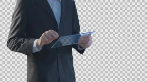 Businessman Turns Clicks Scrolls a Virtual Tablet Working on Forex Exchange Stock Footage 61110267