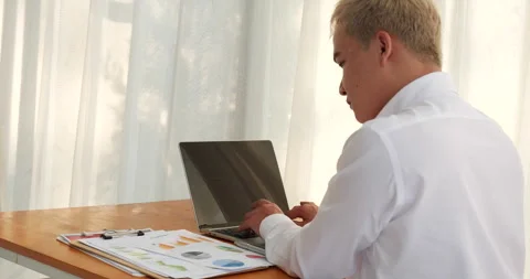 Businessman type keyboard write financial graph chart Stock Footage 312656888