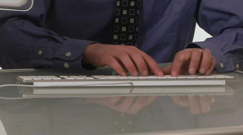 Businessman types on computer 库存影片 399664