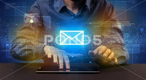 Businessman typing and mailing icon above Stock Photos