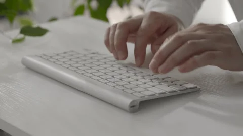 Businessman Typing in Bright Office Stock Footage 314488057