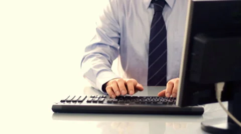 Businessman typing on computer keyboard Stock Footage 2205590