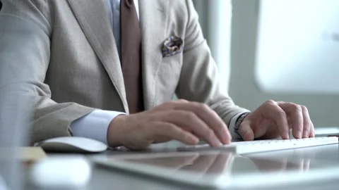 Businessman typing on computer keyboard Stock Footage 134461108