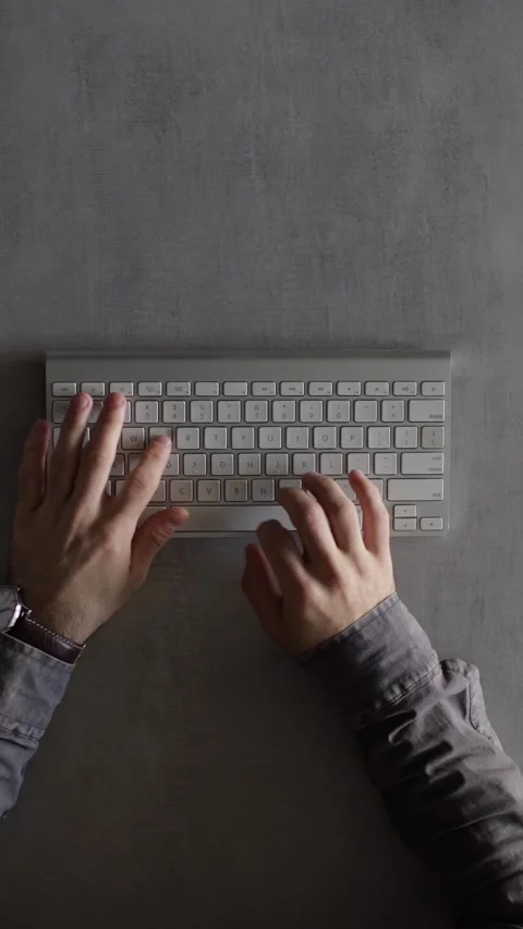 Businessman typing on a computer keyboard Stock Footage 248545189