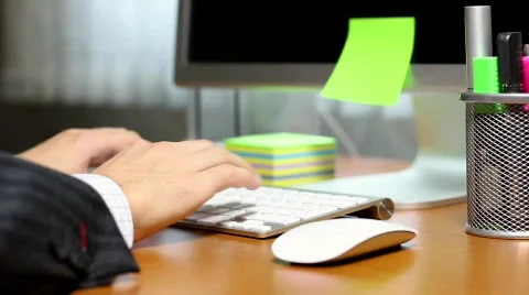 Businessman typing on computer keyboard at office 스톡 동영상 837679