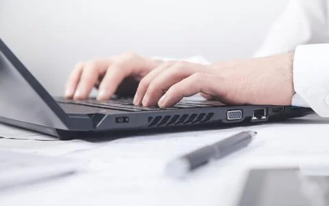 Businessman typing on computer keyboard. Stock Photos