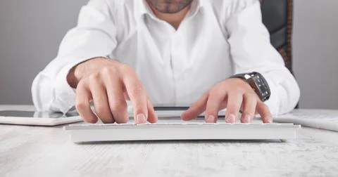 Businessman typing on computer keyboard. Stock Photos